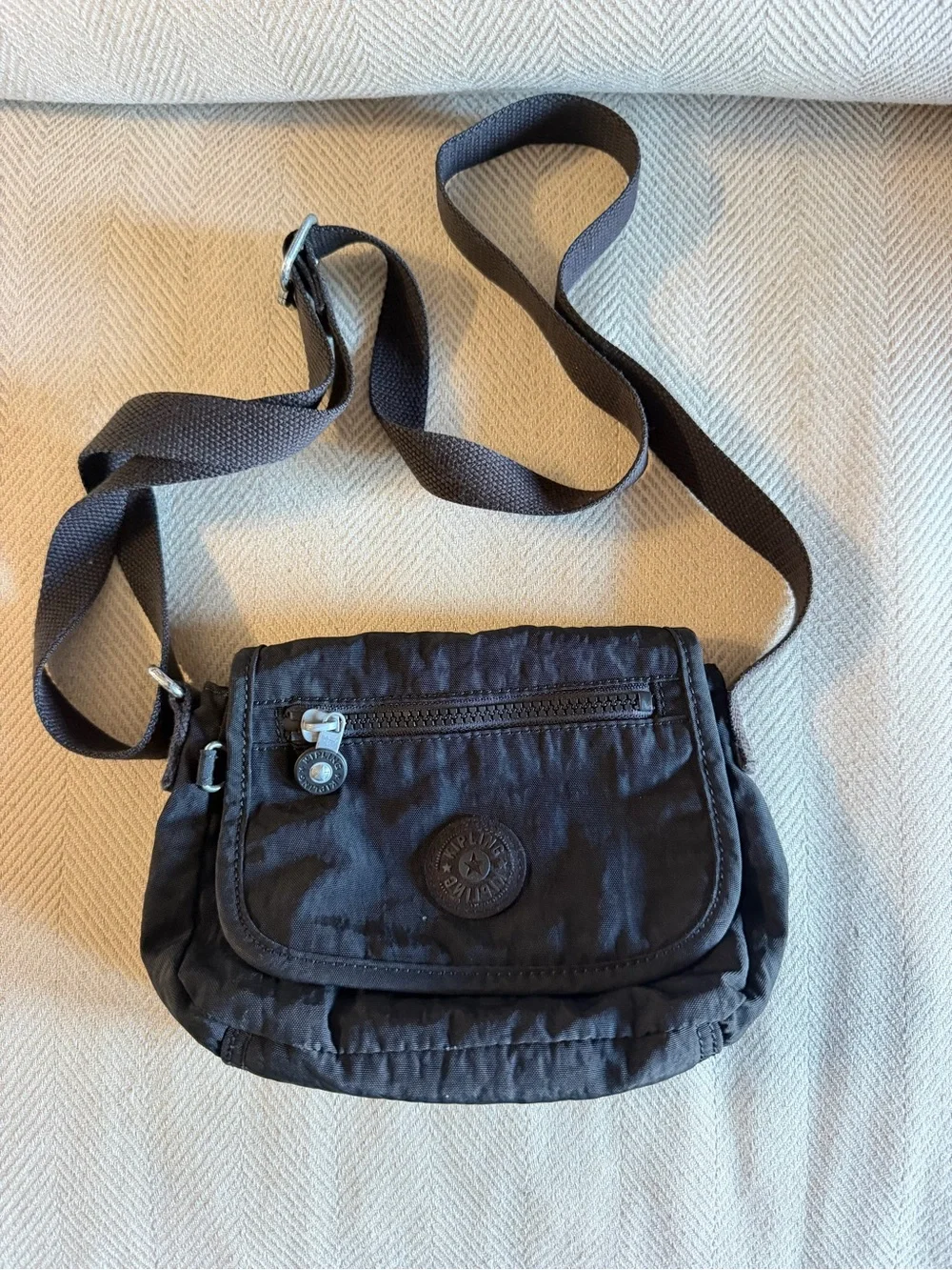 Kipling Black Crossbody Pouch with Beige Interior